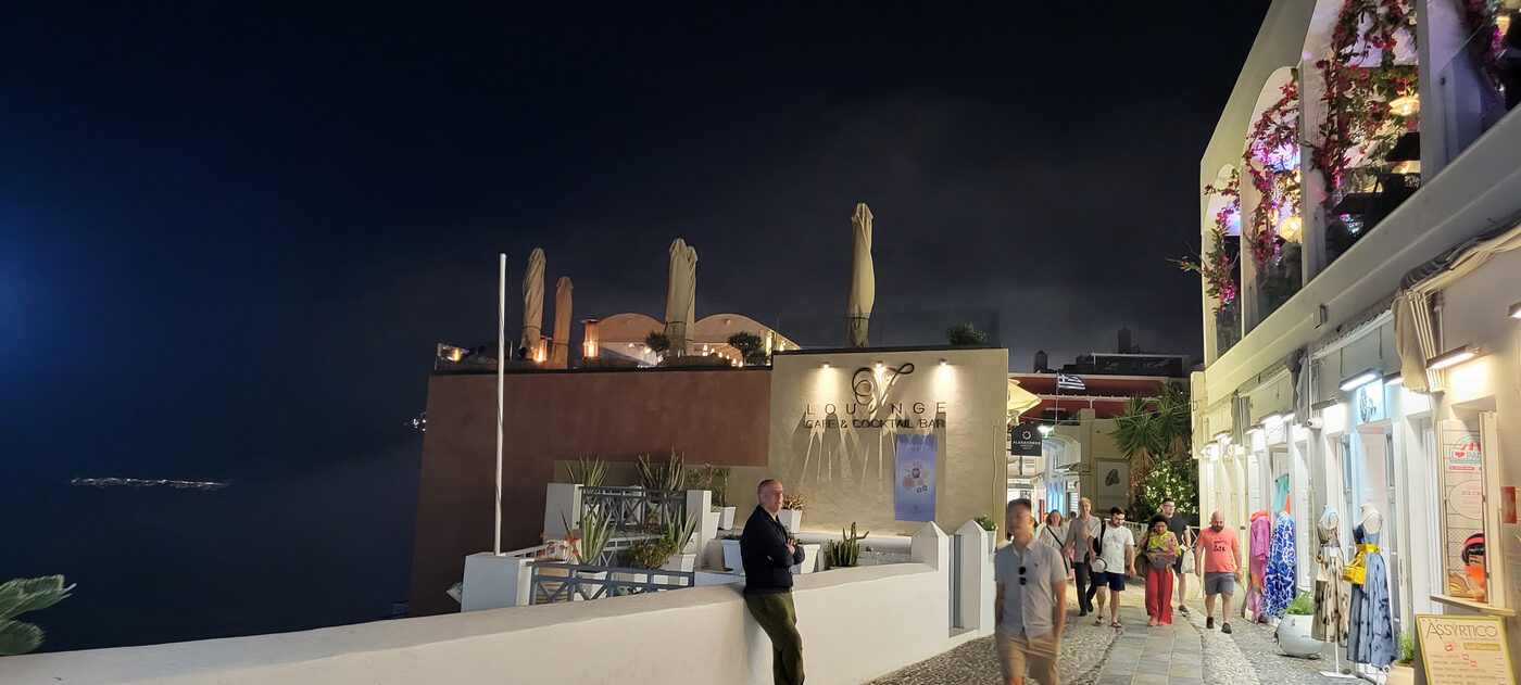 Santorini village at night with lounge bar and sea views